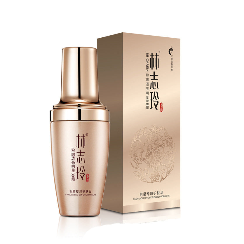 Moisturizing skin care set for ladies with golden serum bottle and elegant packaging.