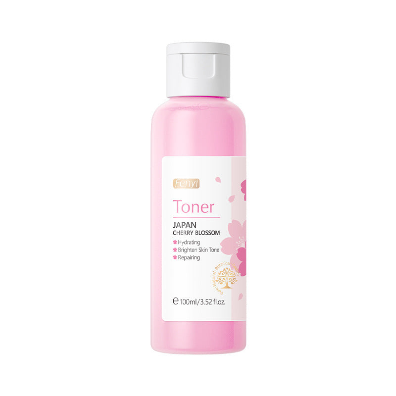 Cherry blossom hydrating lotion in a 100ml bottle with a pink hue for brightening and hydrating skin.